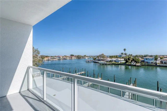 a view of a lake from a balcony