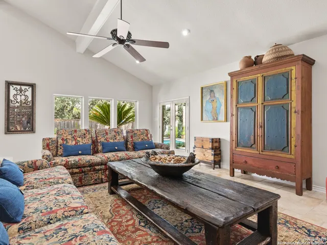 a living room with furniture and window
