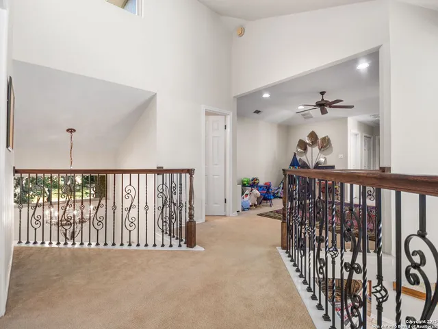 a bedroom with a bed and a table