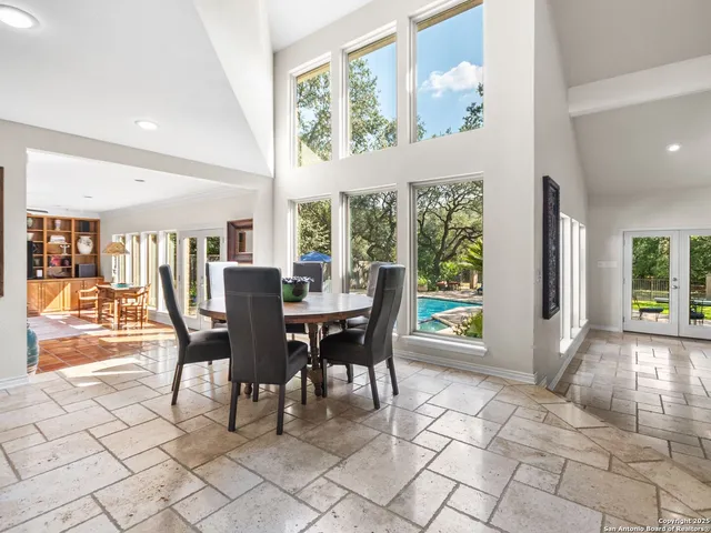 a view of a yard with furniture and a fire pit