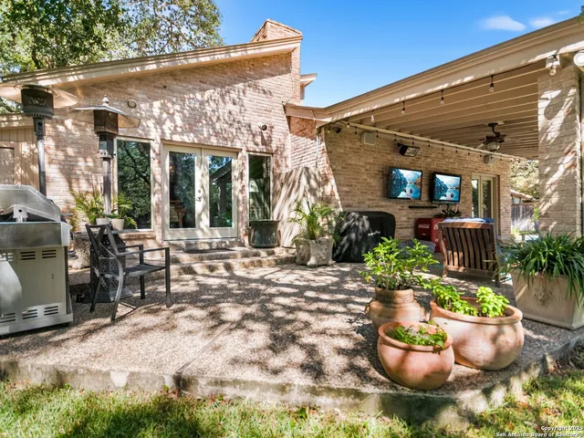 a front view of house with yard and seating area