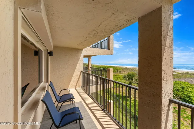a view of balcony with ocean view