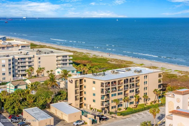 a view of a building with an ocean view