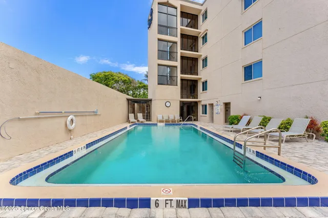 a view of an ocean with a barbeque