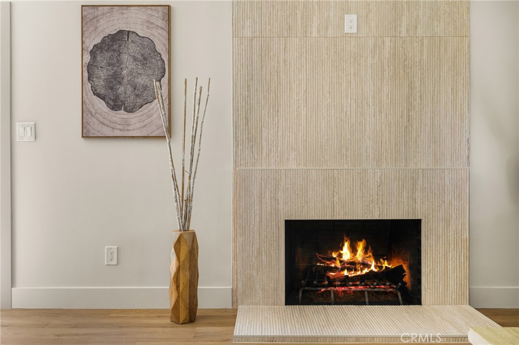 2680 Chatwin Avenue Long Beach, CA 90815 - Photo 13 of 61 a view of fireplace with a painting on the wall and a fireplace
