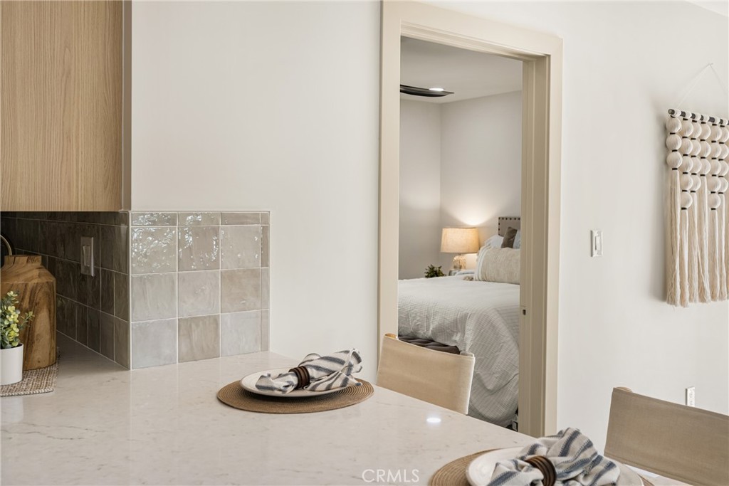 2680 Chatwin Avenue Long Beach, CA 90815 - Photo 18 of 61 a bedroom with a bed and a couch