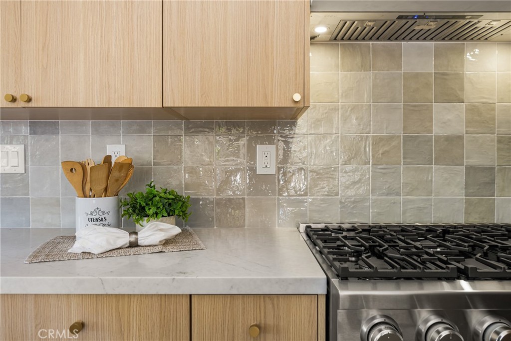 2680 Chatwin Avenue Long Beach, CA 90815 - Photo 33 of 61 a kitchen with a sink and cabinets