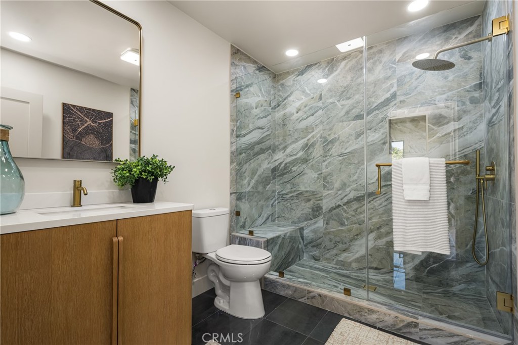 2680 Chatwin Avenue Long Beach, CA 90815 - Photo 40 of 61 a bathroom with a toilet and a shower