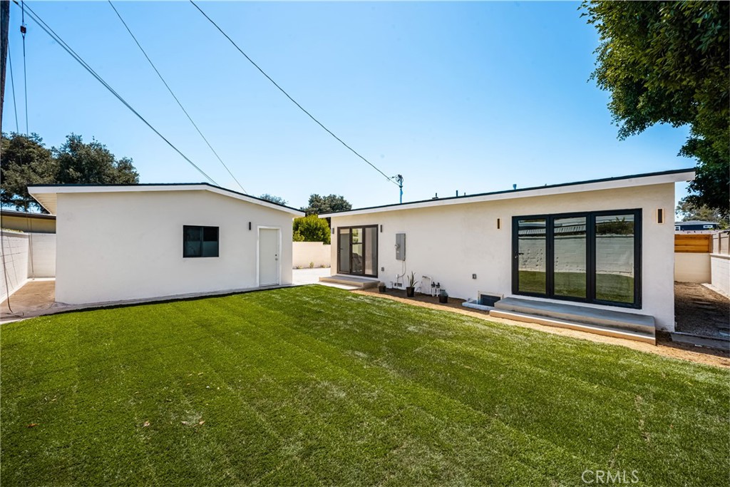 2680 Chatwin Avenue Long Beach, CA 90815 - Photo 48 of 61 a view of a backyard with a garden and yard