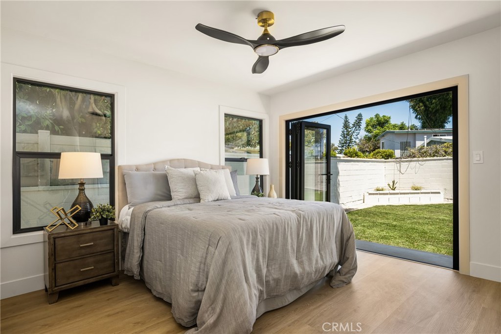 2680 Chatwin Avenue Long Beach, CA 90815 - Photo 56 of 61 a bedroom with a bed and a large window