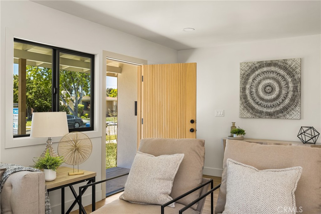 2680 Chatwin Avenue Long Beach, CA 90815 - Photo 10 of 61 a living room with furniture and a large window