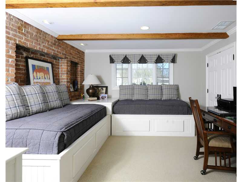 17 Copper Beech Road Greenwich, CT 06830 - Photo 14 of 16 a living room with furniture and a couch