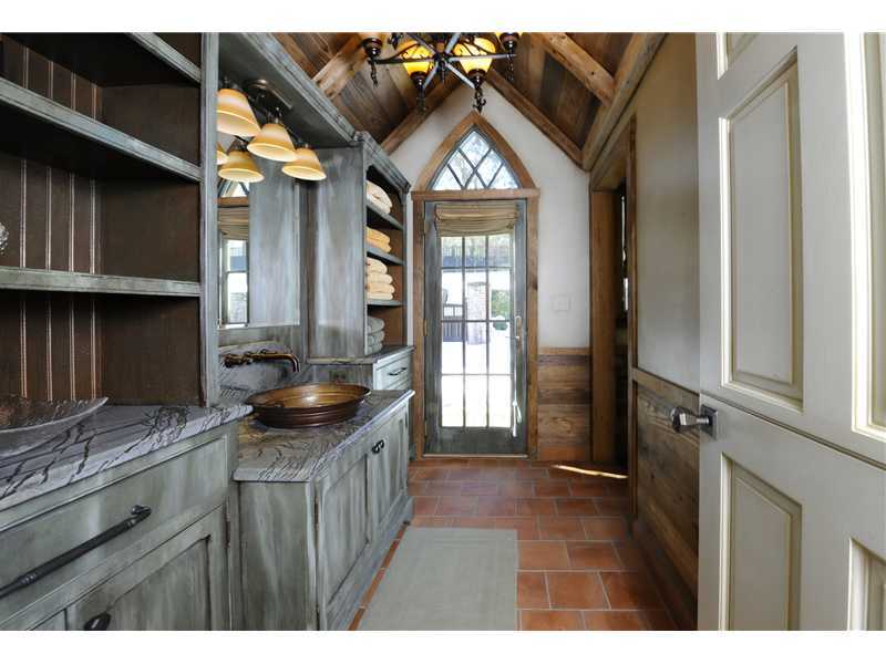 17 Copper Beech Road Greenwich, CT 06830 - Photo 15 of 16 a kitchen with a sink cabinets and a window