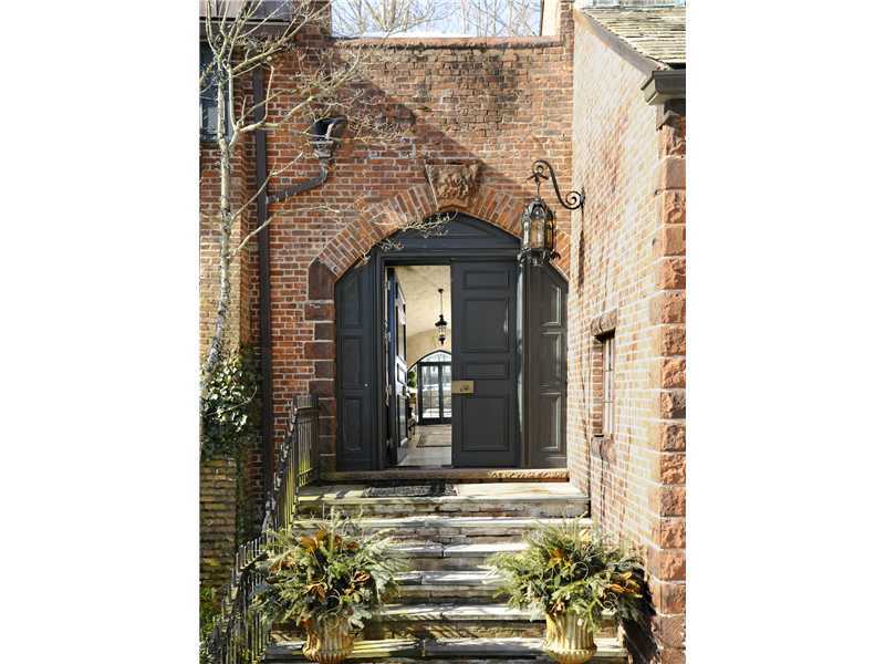 17 Copper Beech Road Greenwich, CT 06830 - Photo 2 of 16 a front view of a house with a yard