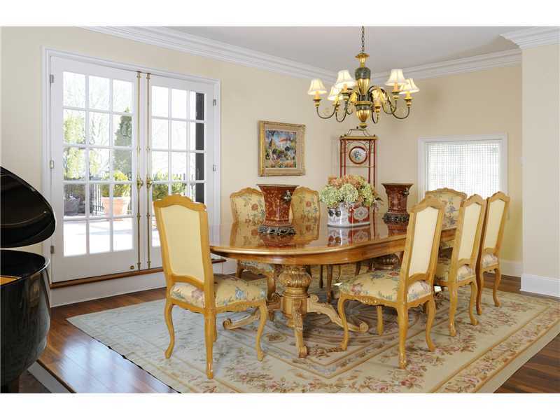 17 Copper Beech Road Greenwich, CT 06830 - Photo 5 of 16 a view of a dining room with furniture and wooden floor