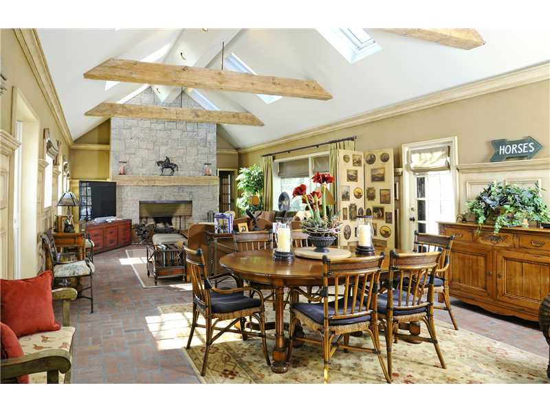17 Copper Beech Road Greenwich, CT 06830 - Photo 8 of 16 a view of a dining room with furniture window and wooden floor