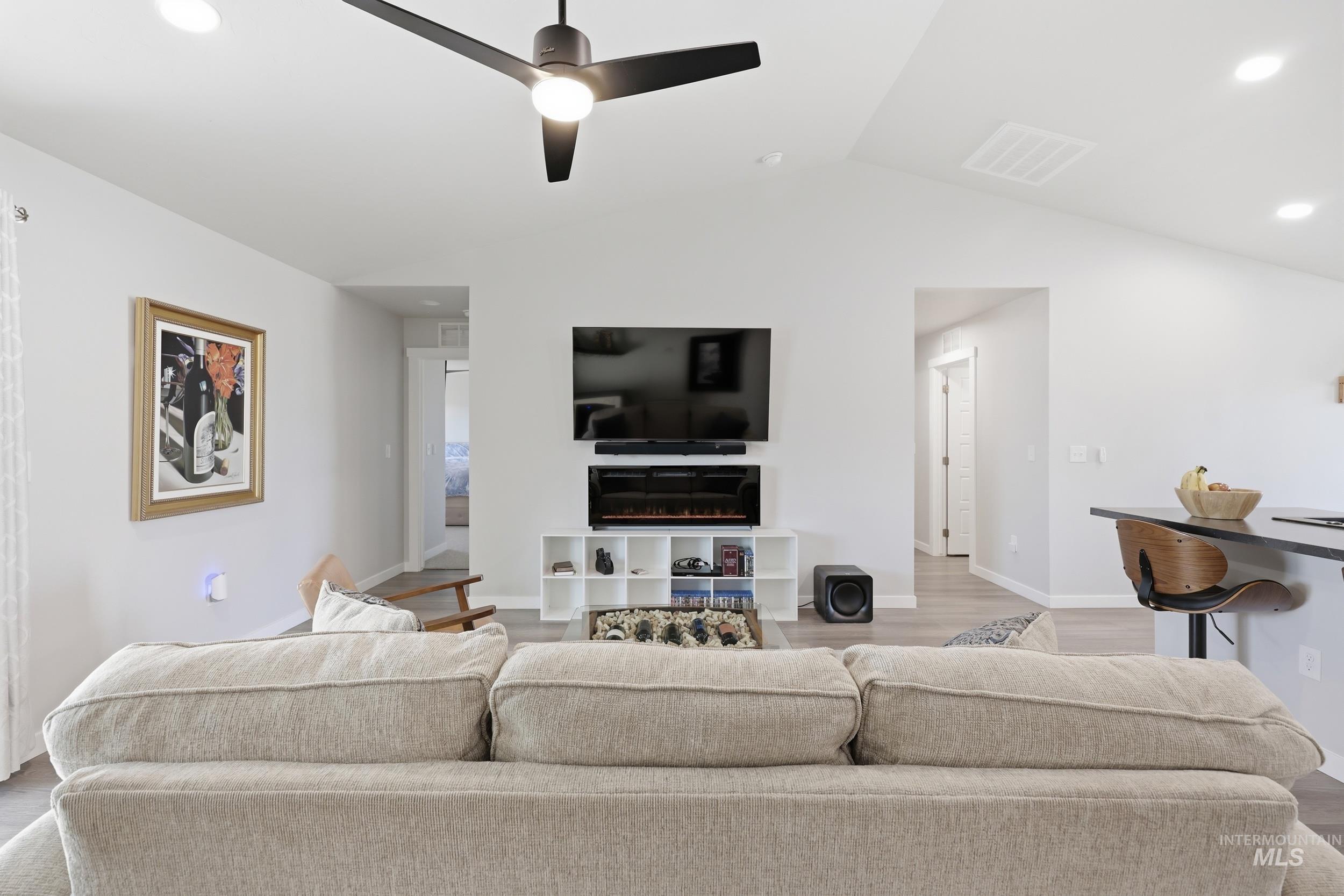 3697 W Lane Meridian, ID 83642 - Photo 16 of 44 Living room with recessed lighting, a ceiling fan, and light wood finished floors