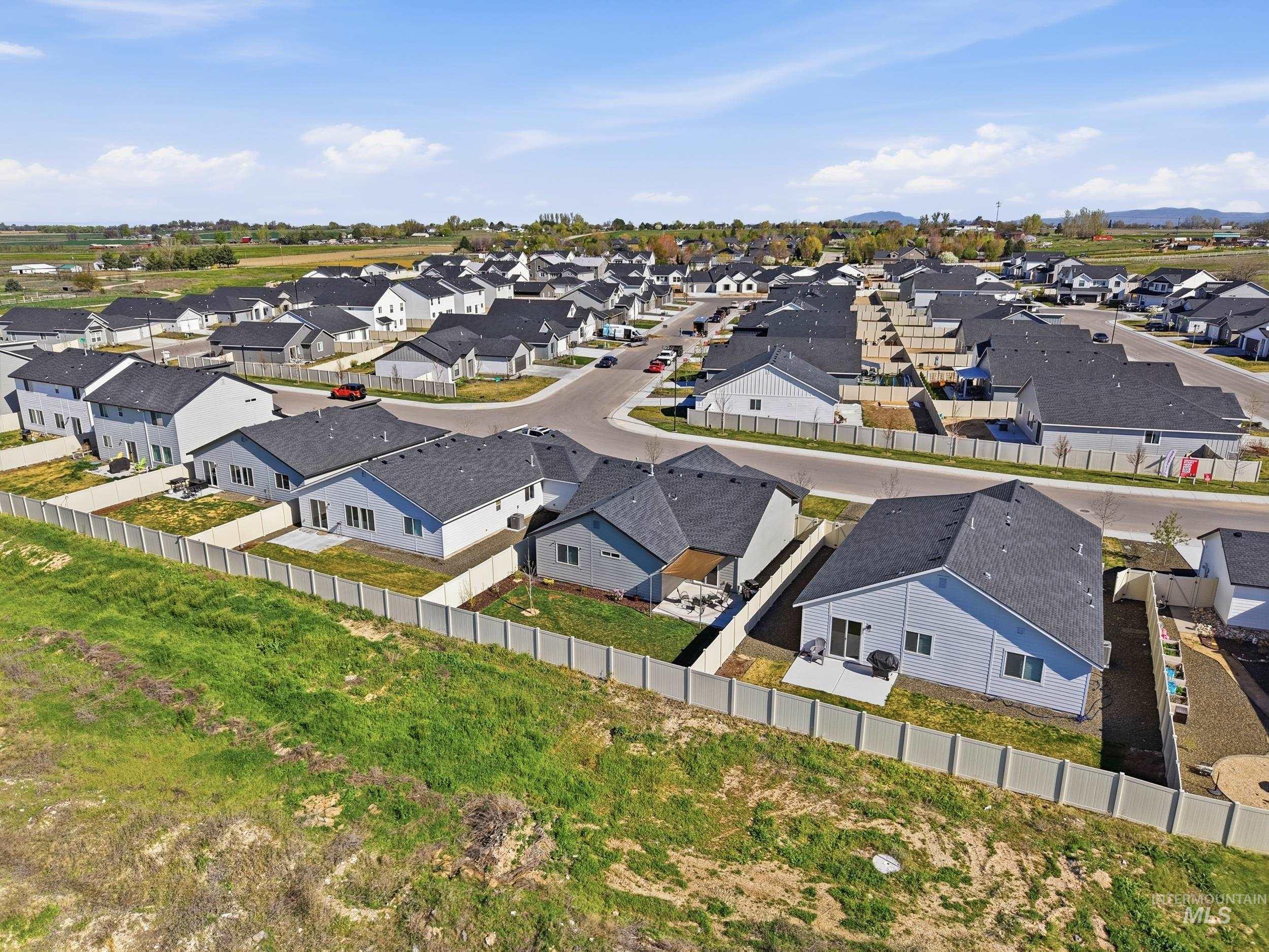 3697 W Lane Meridian, ID 83642 - Photo 43 of 44 Aerial perspective of rear of home.