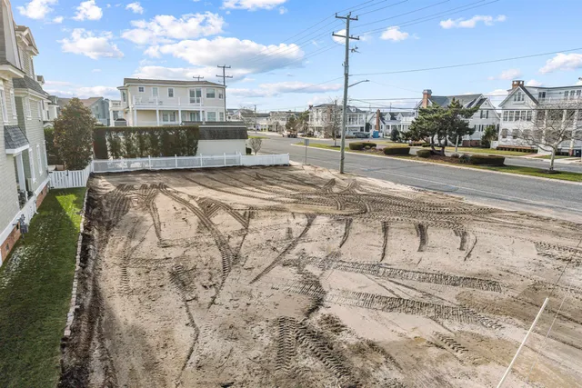 a view of a street with a building