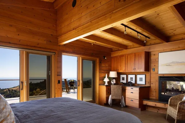 a bedroom with a bed and a tv in it