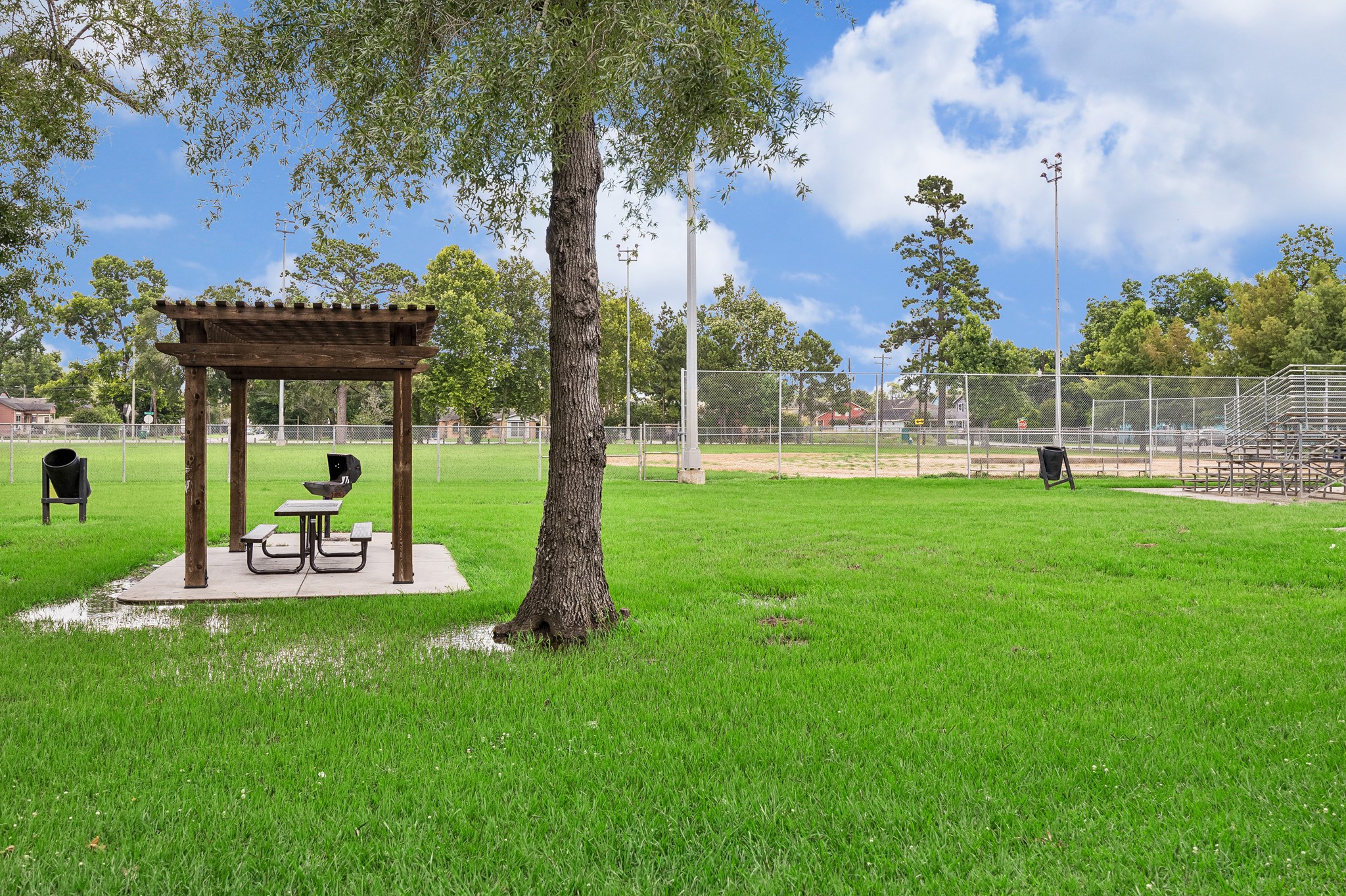 5208 Gano Street Houston, TX 77009 - Photo 5 of 8 Beautiful open green spaces, walking paths, and recreational facilities enhance the neighborhood's appeal. Whether enjoying a morning walk, exercising outdoors, or spending time with family and friends, residents have convenient access to a variety of outdoor amenities.