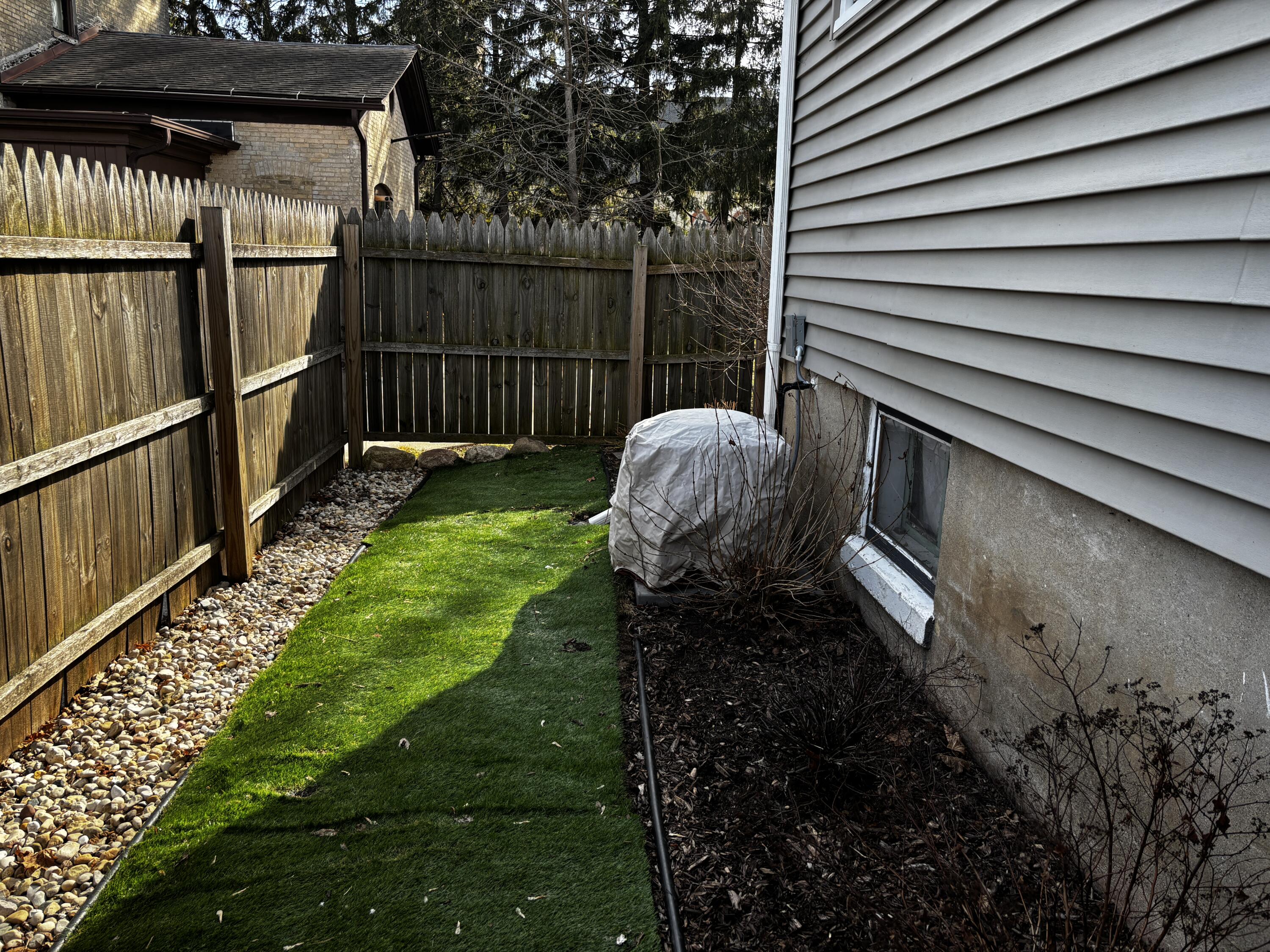 409 O'Connell Street Watertown, WI 53094 - Photo 40 of 40 Side yard with artificial turf