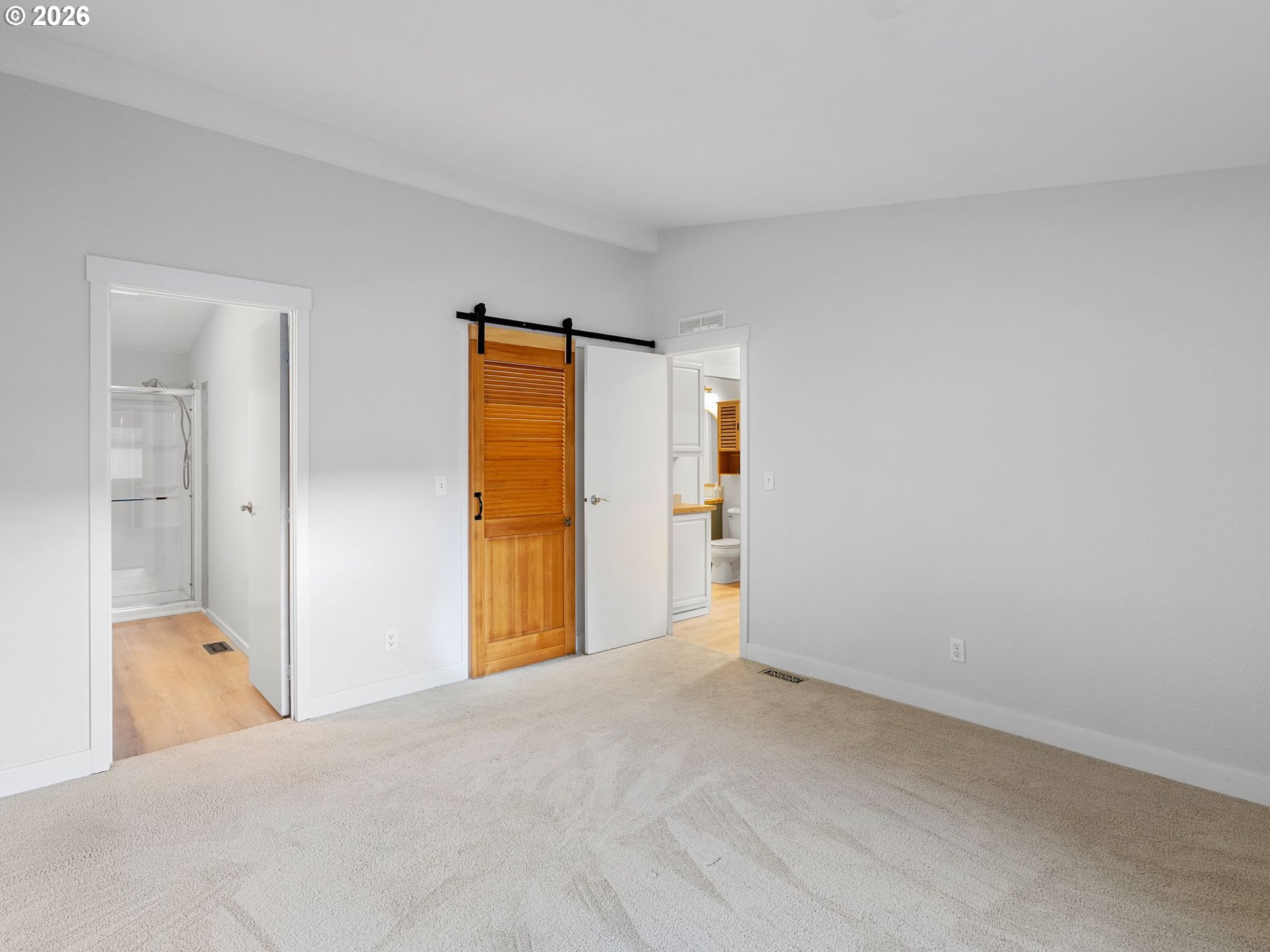 15768 Southeast Powell Boulevard, Unit 12 Portland, OR 97236 - Photo 22 of 31 a view of hallway with natural light