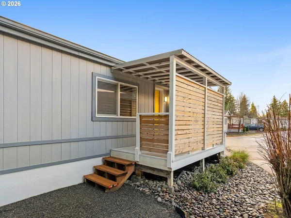 a view of a back yard of the house