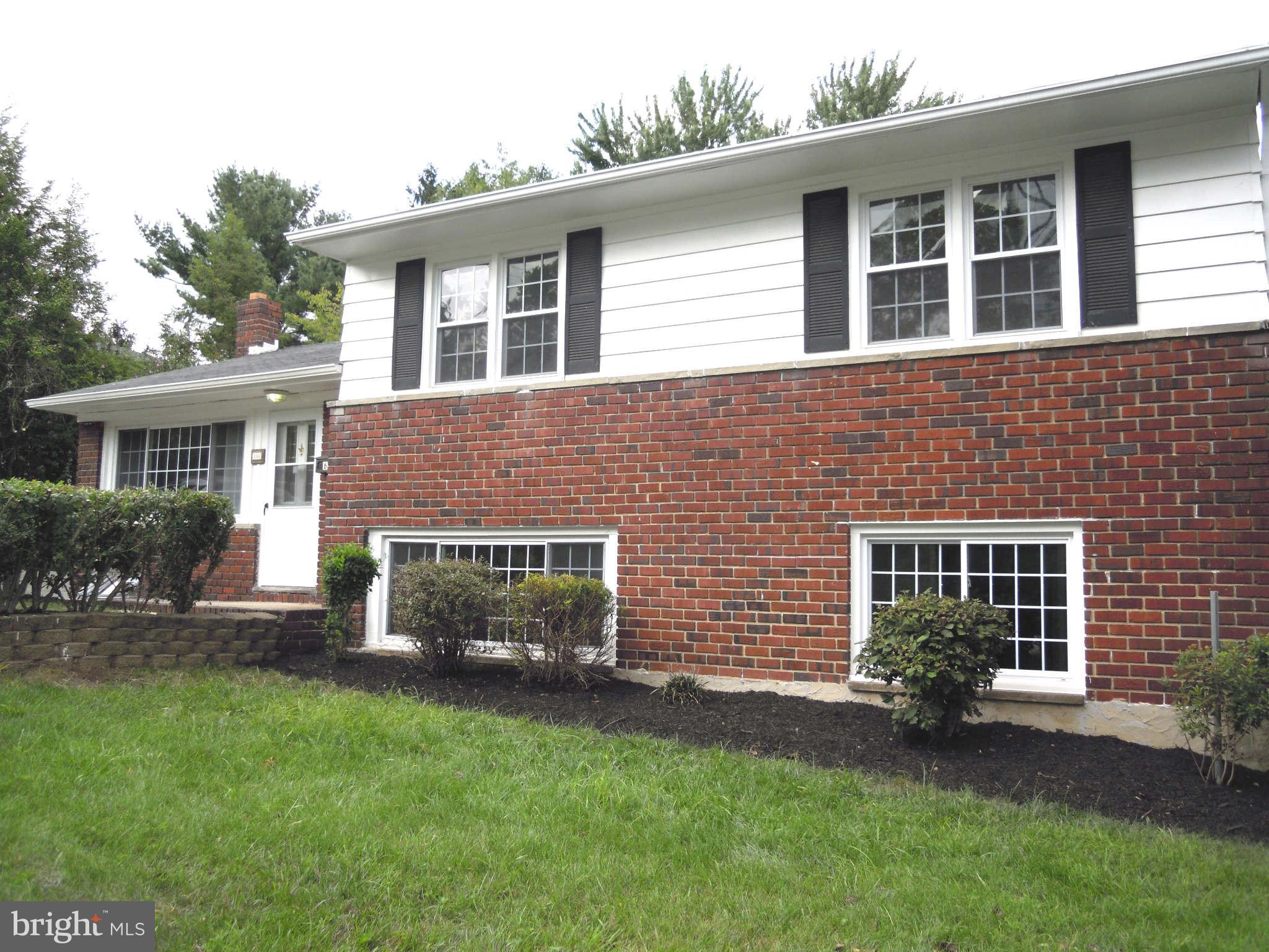 612 Providence Road Baltimore, MD 21286 - Photo 21 of 24 front view of a house with a yard