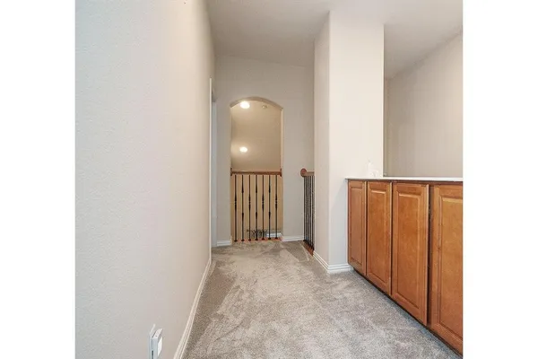 a view of a livingroom with wooden floor