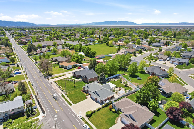776 Flint Street Layton, UT 84041 - Photo 33 of 41 Expansive residential area featuring numerous single-family homes with lush green lawns and mature trees