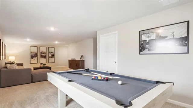 a living room with a couch and a table