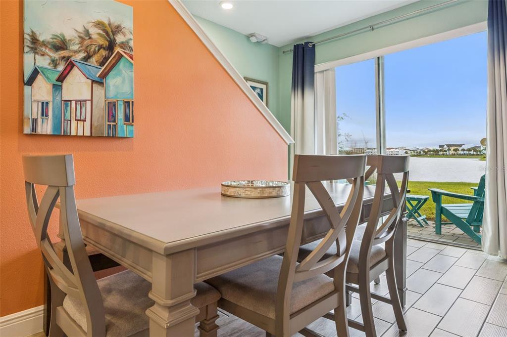 2949 Caribbean Soul Drive Kissimmee, FL 34747 - Photo 13 of 88 a view of an chairs and tables in the balcony