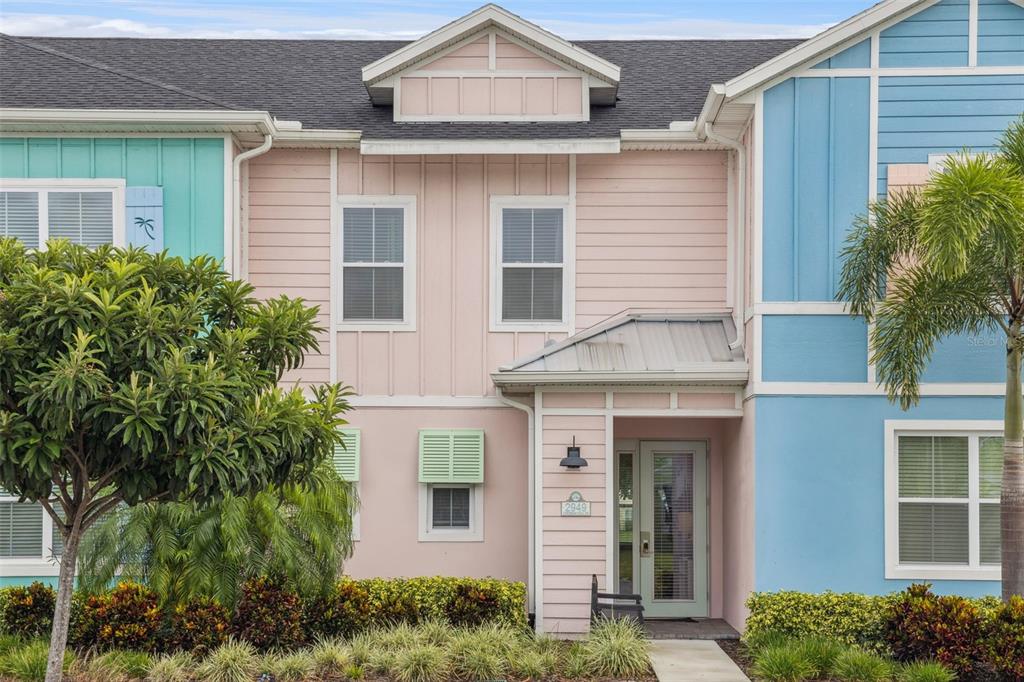 2949 Caribbean Soul Drive Kissimmee, FL 34747 - Photo 2 of 88 a front view of a house with plants