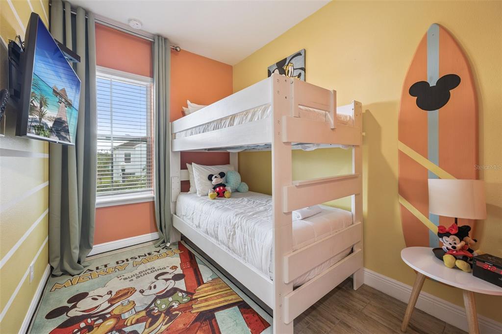 2949 Caribbean Soul Drive Kissimmee, FL 34747 - Photo 29 of 88 a bedroom with a bed and a window