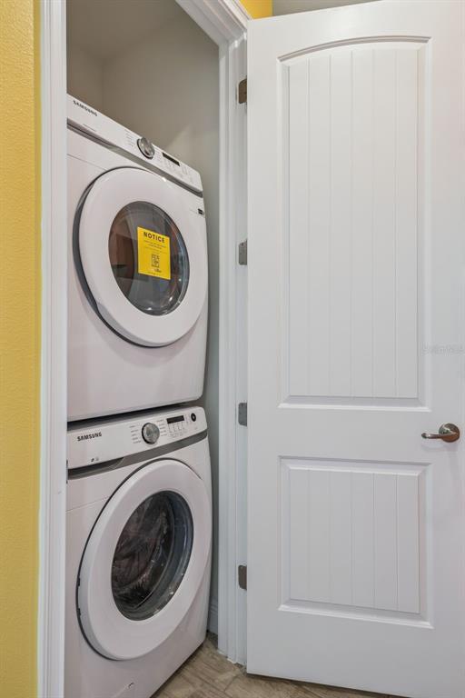 2949 Caribbean Soul Drive Kissimmee, FL 34747 - Photo 30 of 88 a utility room with dryer and washer