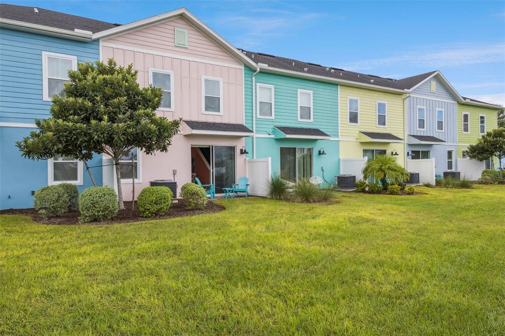 2949 Caribbean Soul Drive Kissimmee, FL 34747 - Photo 31 of 88 a front view of a house with a yard