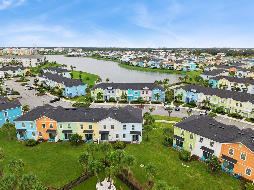 2949 Caribbean Soul Drive Kissimmee, FL 34747 - Photo 39 of 88 an aerial view of multiple houses with a yard