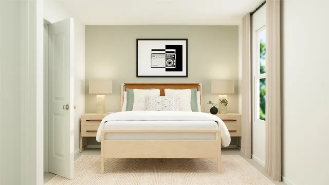 a spacious bedroom with a bed and a window