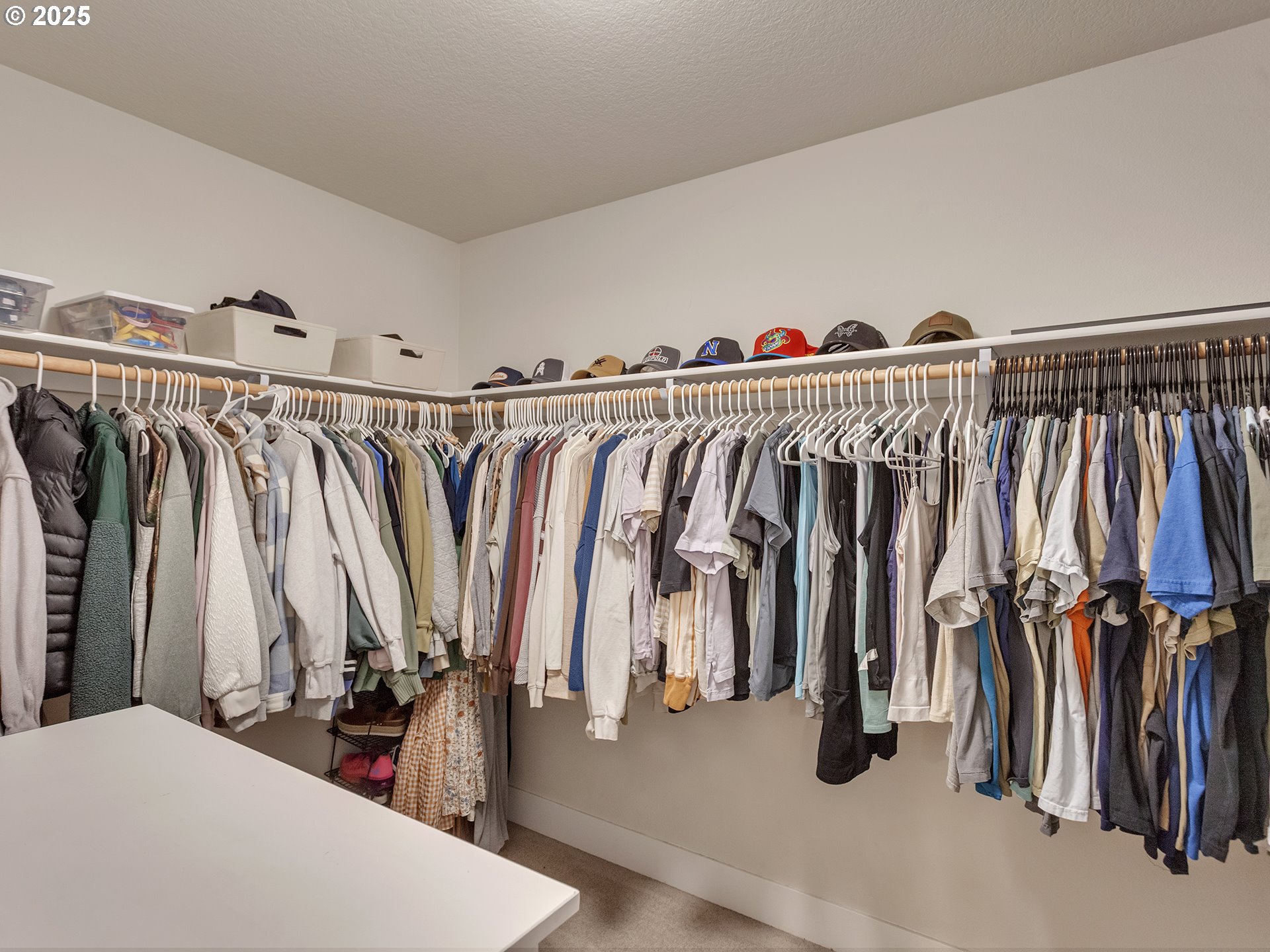 2918 Juniper Drive Newberg, OR 97132 - Photo 25 of 42 a view of walk in closet with clothes and shoes