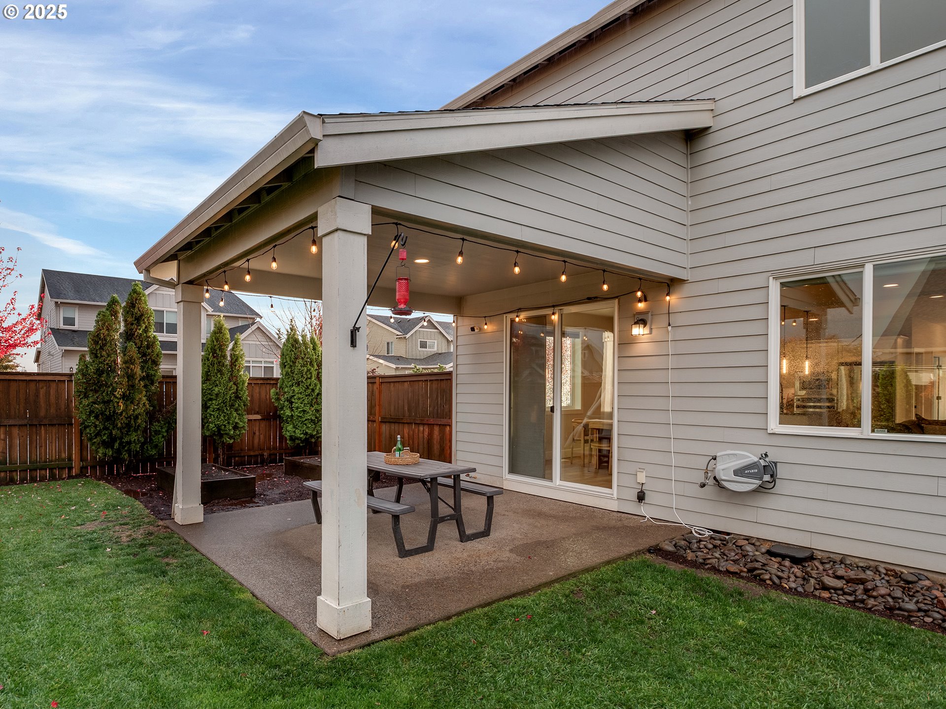 2918 Juniper Drive Newberg, OR 97132 - Photo 34 of 42 a view of a chair and table in backyard of the house