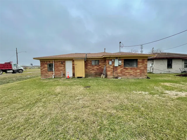 a house view with a garden space