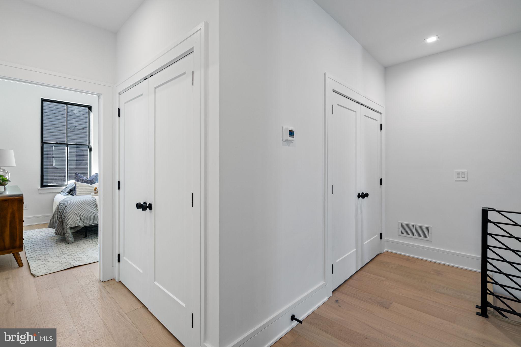 249 Philip Way Philadelphia, PA 19106 - Photo 26 of 61 a view of a bedroom with closet and wooden floor
