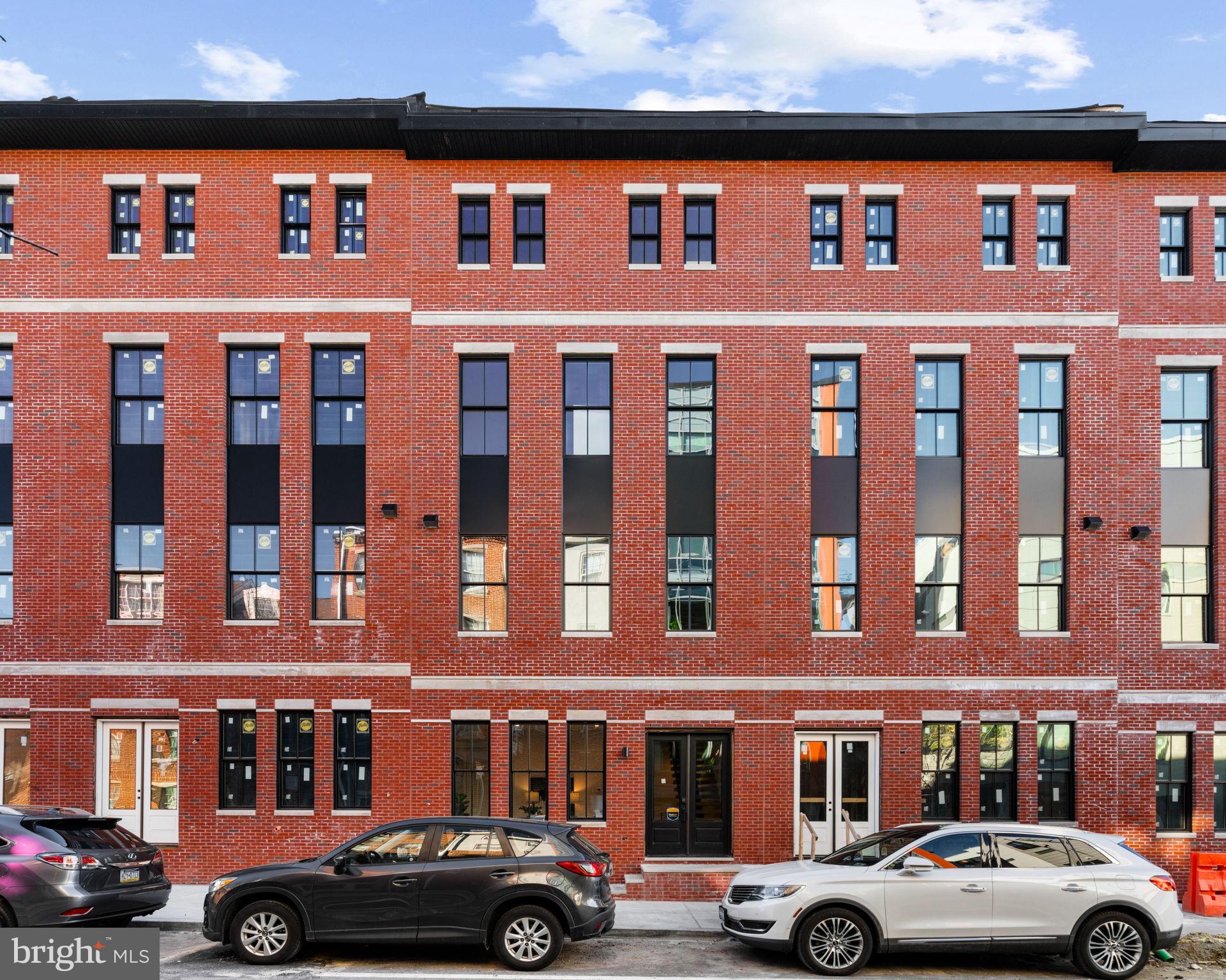 249 Philip Way Philadelphia, PA 19106 - Photo 60 of 61 a front view of a building with parking space