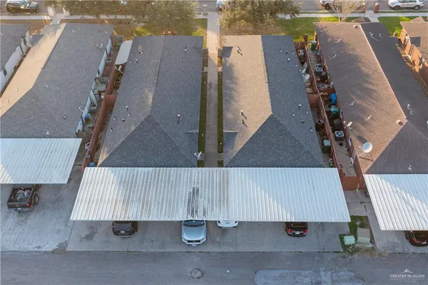 an aerial view of a house with swimming pool
