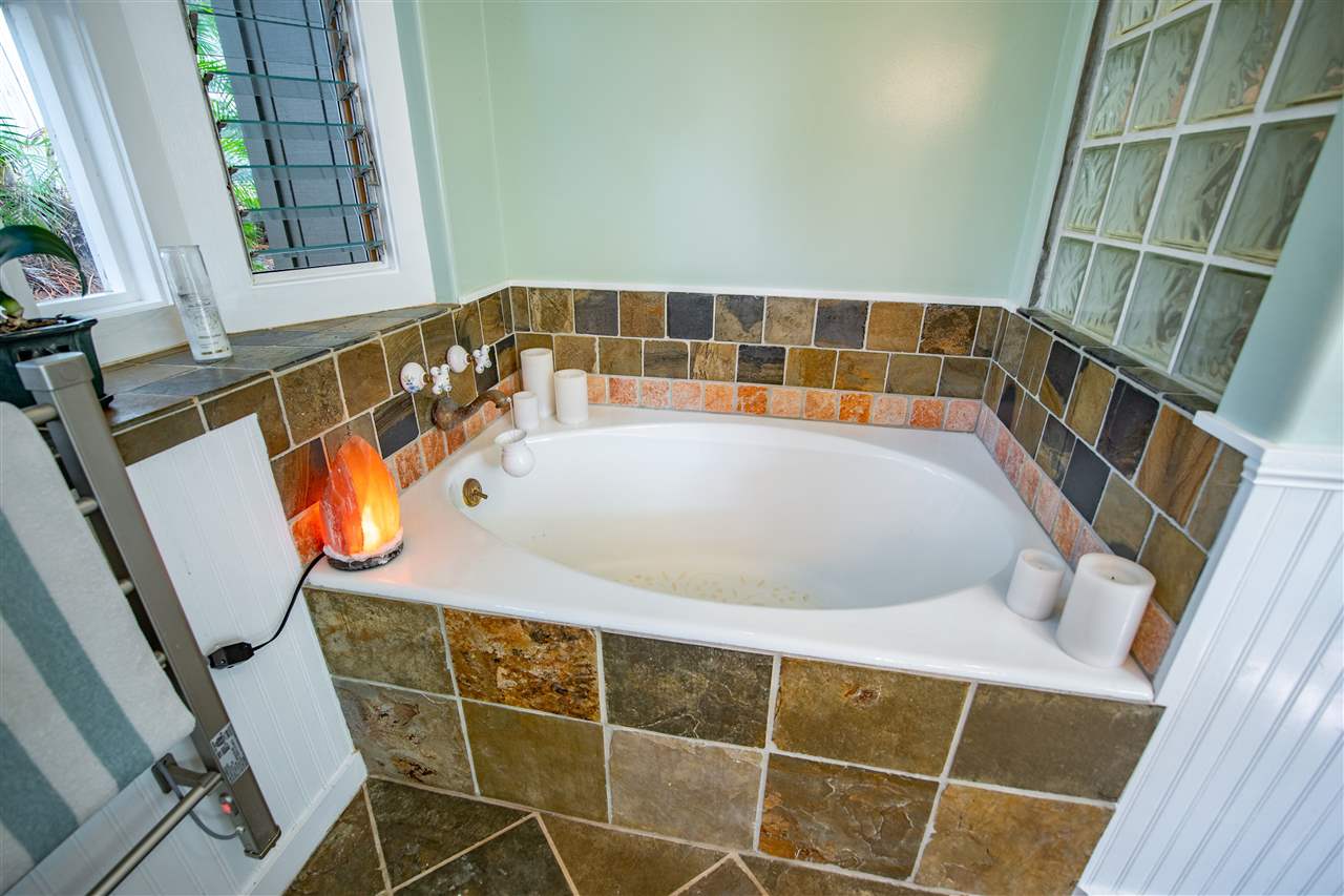 475 Haumana Road Haiku, HI 96708 - Photo 13 of 30 a bathroom with a tub and shower