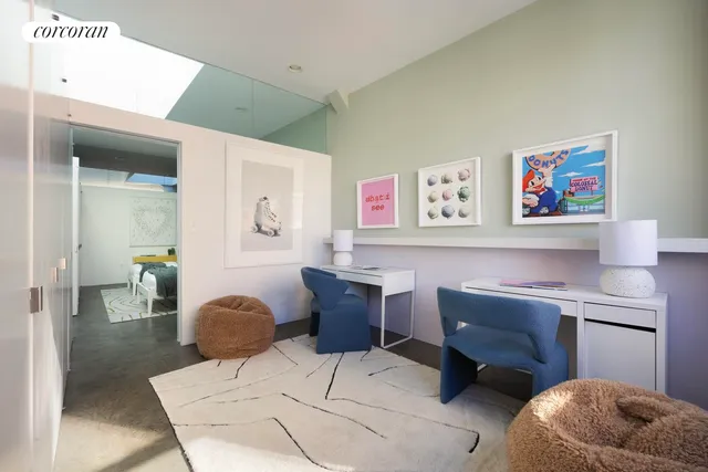 a room with a table and chairs