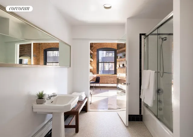 a view of a building with potted plants