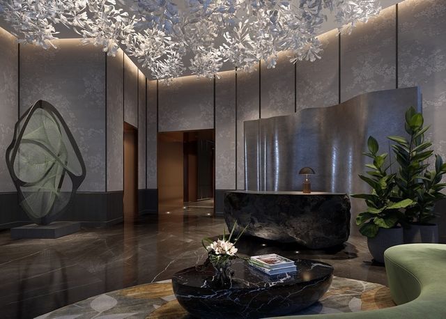 a bedroom with furniture and a rug