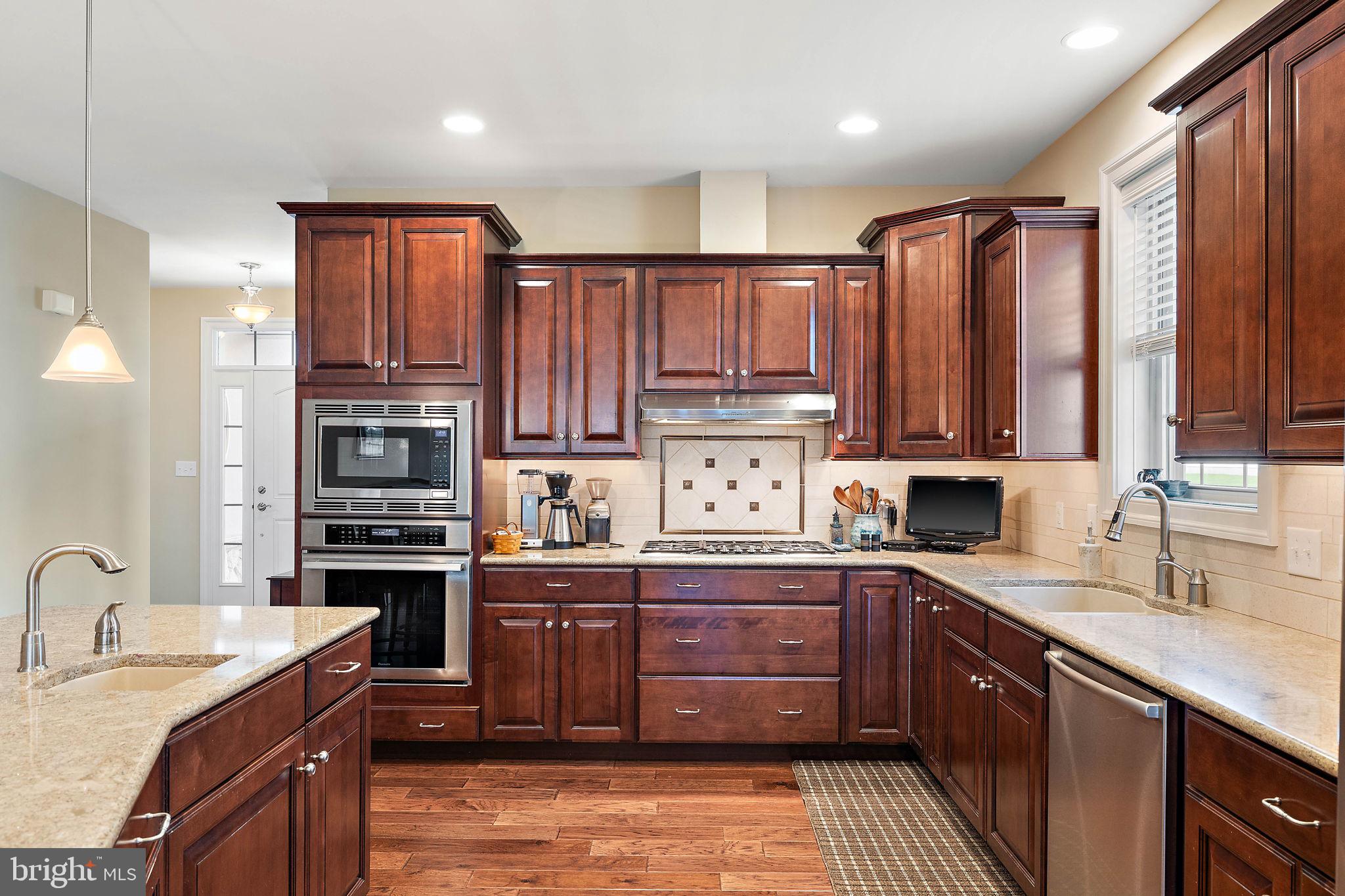 716 Bee Rdg Path Cochranville, PA 19330 - Photo 11 of 54 Gourmet kitchen w/double wall oven & cooktop